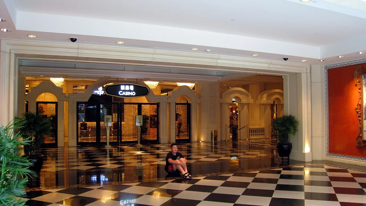 Stadium electronic table gaming terminal bank in a modern Macau casino resort